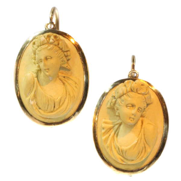 Antique Victorian lava stone cameo earrings set in gold mounting